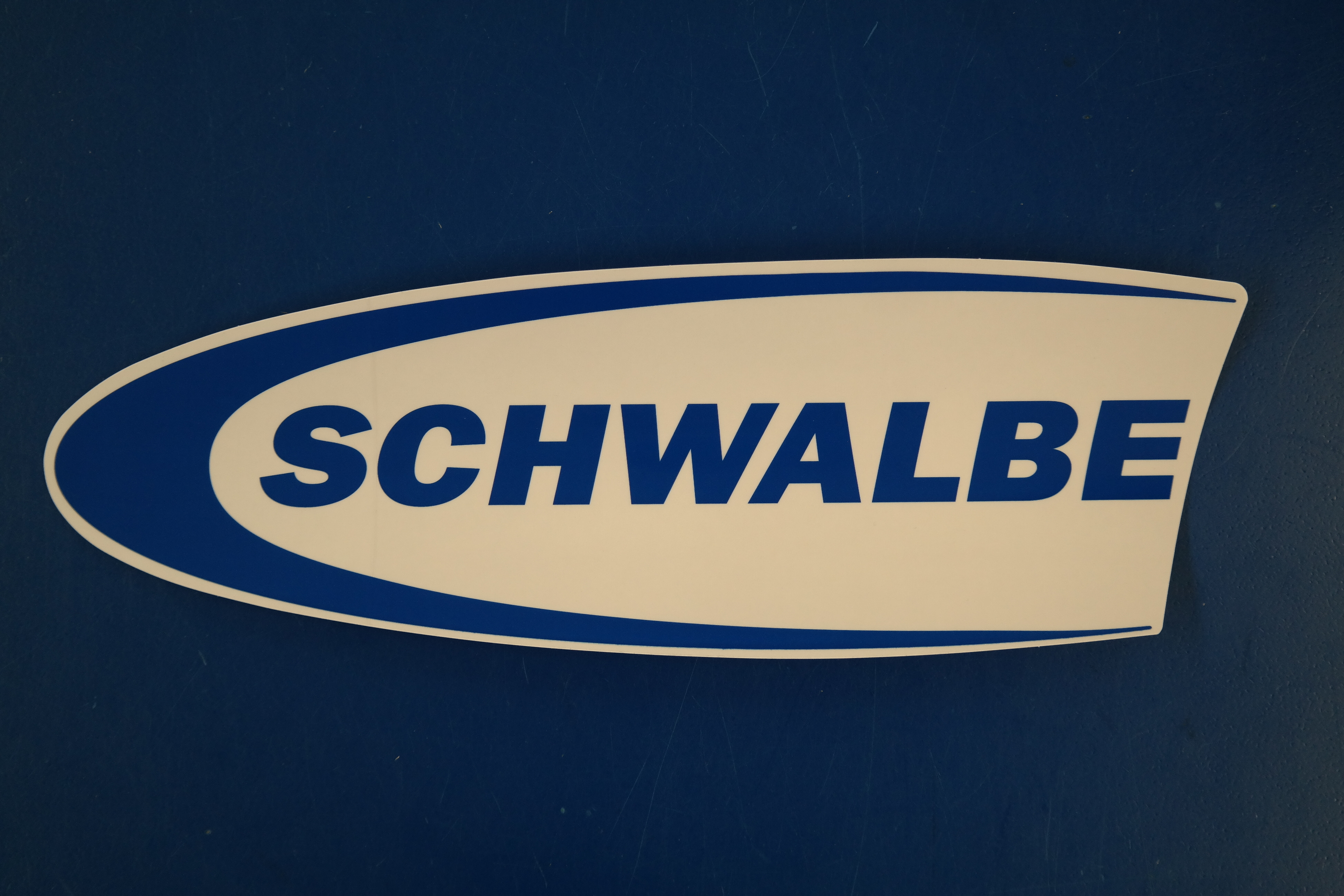 Schwalbe Aufkleber blau/transparent